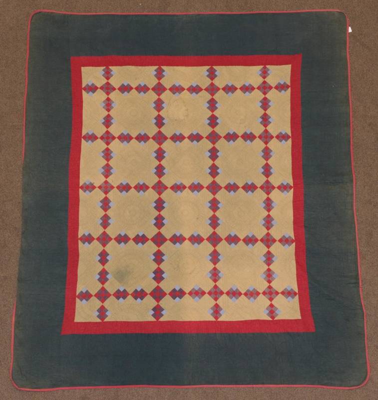 Lot 2039 - Circa 1890 American Amish Quilt, comprising a backing cloth of sage green, split by a trellis...