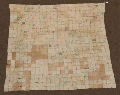 Lot 2042 - Circa 1930 African American Unfinished Patchwork Coverlet, incorporating feed sacks, shirting...
