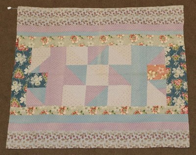 Lot 2045 - Circa 1920s Medallion Patchwork Quilt, incorporating earlier blue and mauve dress cottons,...