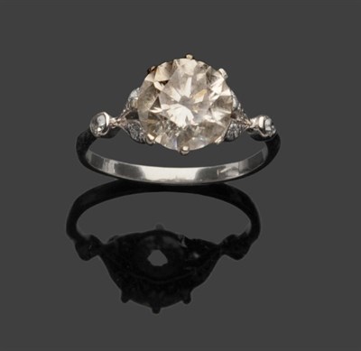 Lot 485 - A Diamond Solitaire Ring, the round brilliant cut diamond held in a white eight claw setting to...