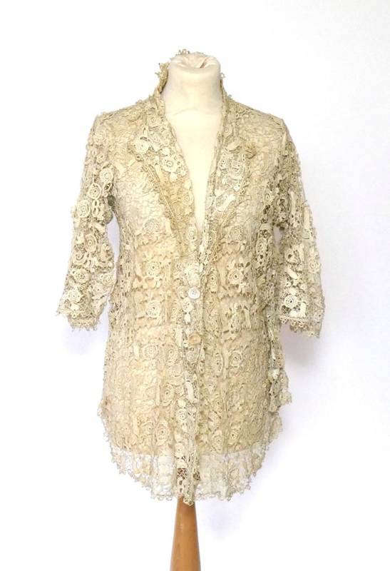 Lot 2059 - An Edwardian Irish Lace Jacket, with three quarter length flared sleeves, collar and lapels,...