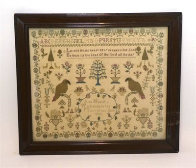 Lot 2069 - 19th Century Sampler, Worked By Anne Heslop, Aged 9, Dated 1830, worked centrally with trees,...