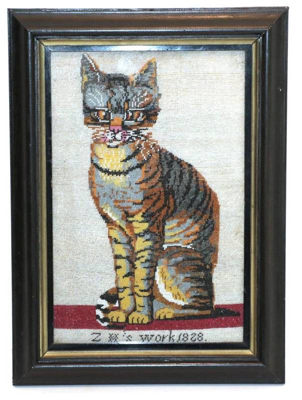Lot 2078 - Early 19th Century Small Bead Work Panel of a Seated Tabby Cat, beaded over the whole canvas,...