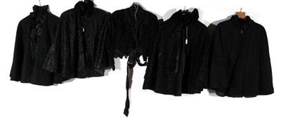 Lot 2093 - Four Late 19th Century Black Capelets and a Bodice, comprising a black wool capelet with ribbon...