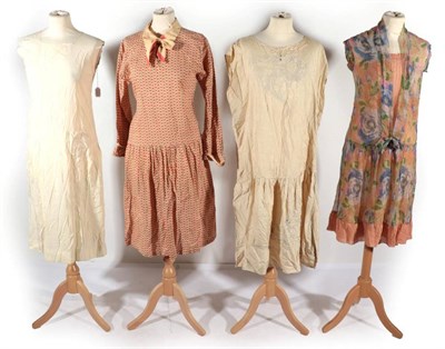 Lot 2110 - Circa 1920s Day Dresses, comprising a geometric print red and cream cotton dress, with upturned 3/4