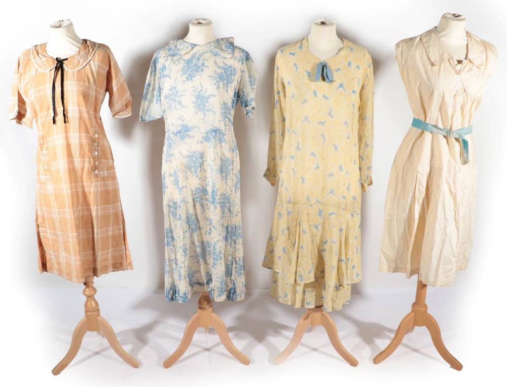 Lot 2113 - Circa 1920s Day Dresses, comprising a cream cotton sleeveless tennis dress, with embroidered tennis