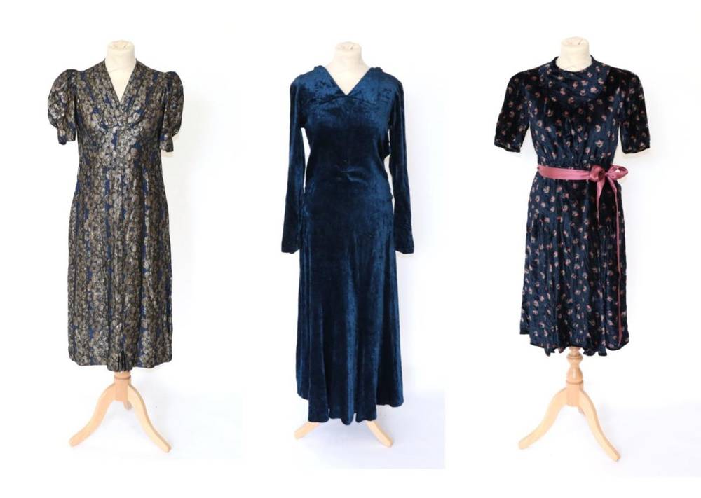 Lot 2128 - Three Circa 1930s Evening Dresses, comprising a blue and silver brocade floral dress, with bellowed