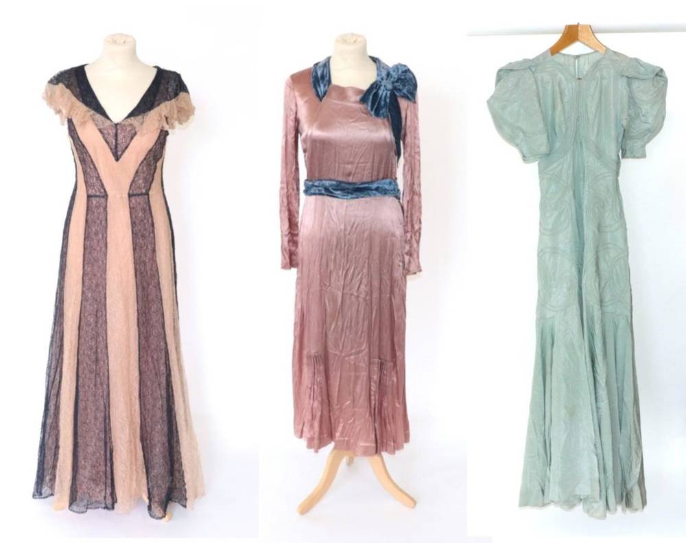 Lot 2129 - Three Circa 1930s Evening Dresses, comprising a duck egg blue dress, with bellowed and puffed short