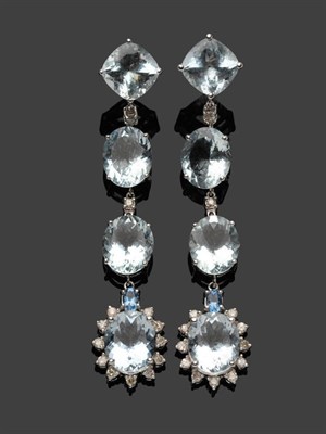 Lot 493 - A Pair of Aquamarine and Diamond Drop Earrings, a cushion cut aquamarine suspends two oval cut...