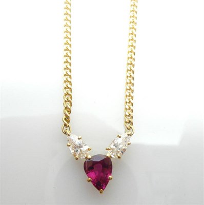 Lot 498 - A Ruby and Diamond Necklet, a pear cut ruby between two pear cut diamonds in yellow claw...