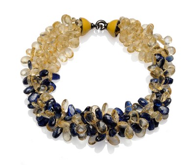 Lot 500 - A Citrine and Kyanite Torsade, graduated faceted pear shaped citrines strung with faceted...