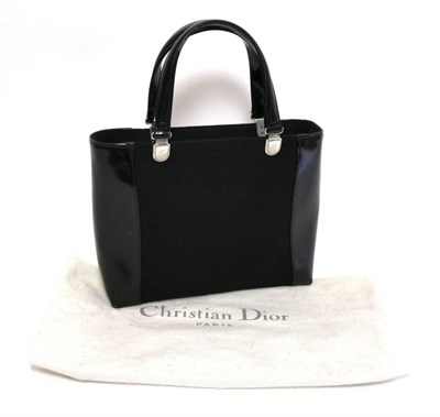 Lot 2226 - Christian Dior Black Leather and Wool Handbag, with twin carry handles attached by silver...