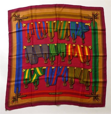 Lot 2246 - Hermès ''Les Sangles'' Silk Scarf, Designed by Joachim Metz, printed with vibrantly coloured...