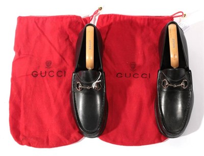Lot 2250 - Pair of Gentleman's Gucci Black Leather Loafers, with chrome snaffle bar (size 43.5) with two...