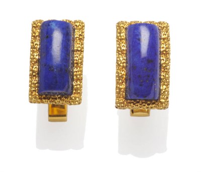 Lot 507 - A Pair of Lapis Lazuli Set Cufflinks, the curved textured rectangular frame set with a cabochon...