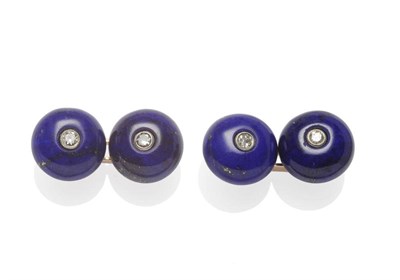 Lot 509 - A Pair of Lapis Lazuli and Diamond Cufflinks, each cabochon lapis lazuli set centrally with a round