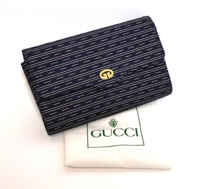 Lot 2287 - Gucci Blue and Gold Clutch / Hand Bag, striped with gold coloured thread interspersed with...