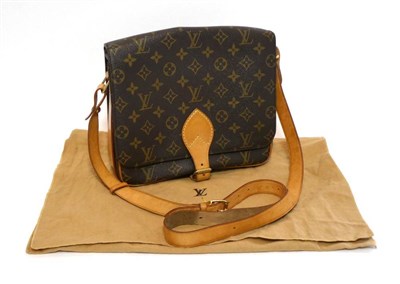 Lot 2298 - Louis Vuitton 'Cartouchiere' Monogram Cross Body Shoulder Bag, trimmed in tan leather, with...
