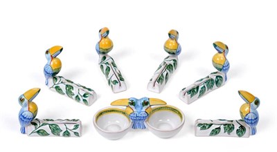 Lot 2305 - Hermès Moustiers Set of Six Ceramic Toucan Place Card Holders, each modelled with a toucan perched