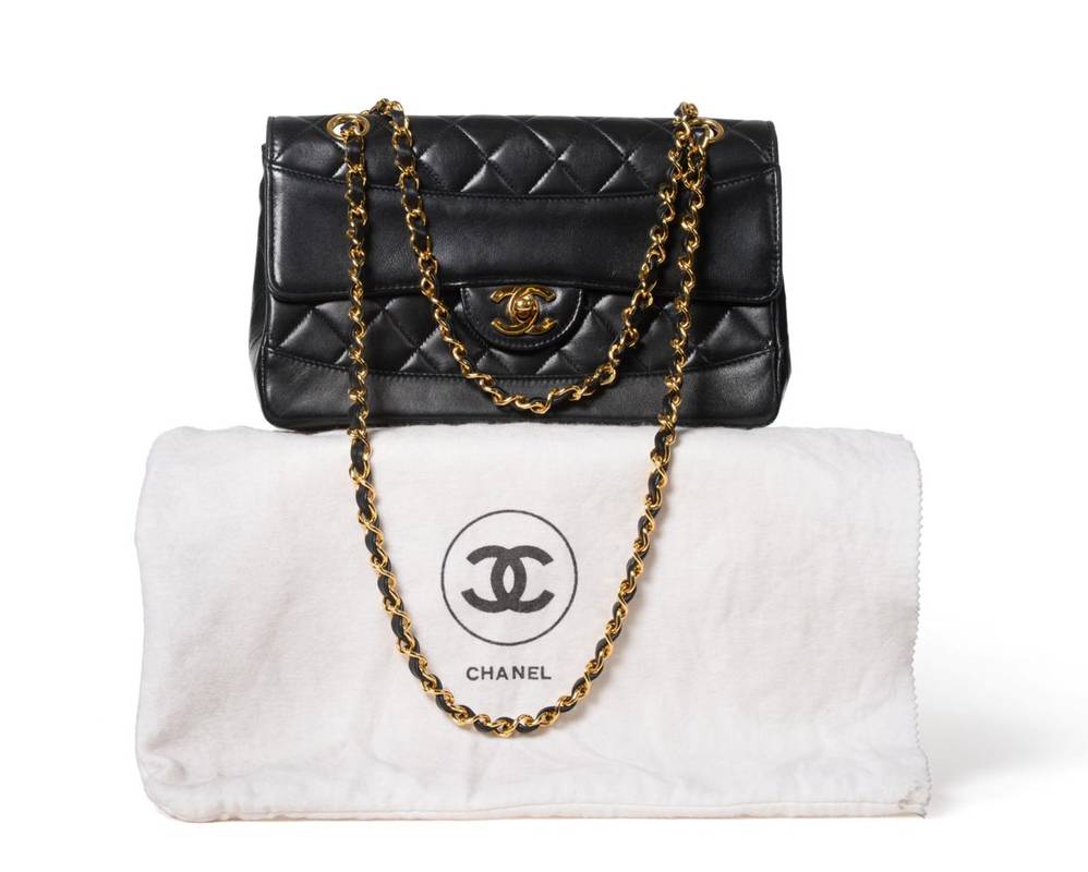 Lot 2306 - Chanel Black Quilted Lambskin Leather Handbag, Circa 1989-1991, with double chain weave...