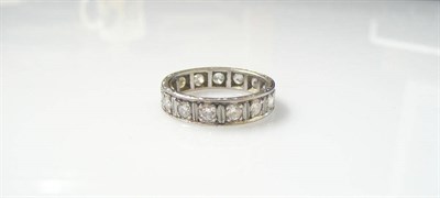 Lot 513 - A Diamond Full Eternity Ring, the round brilliant cut diamonds in white claw settings within a flat