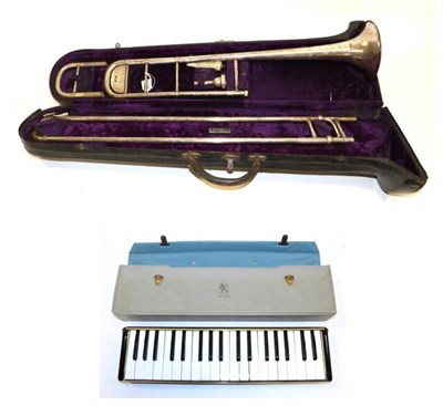 Lot 3024 - Trombone 'The Cabaret' By Hawkes & Son (London) no.54078, small bore trombone with both high...