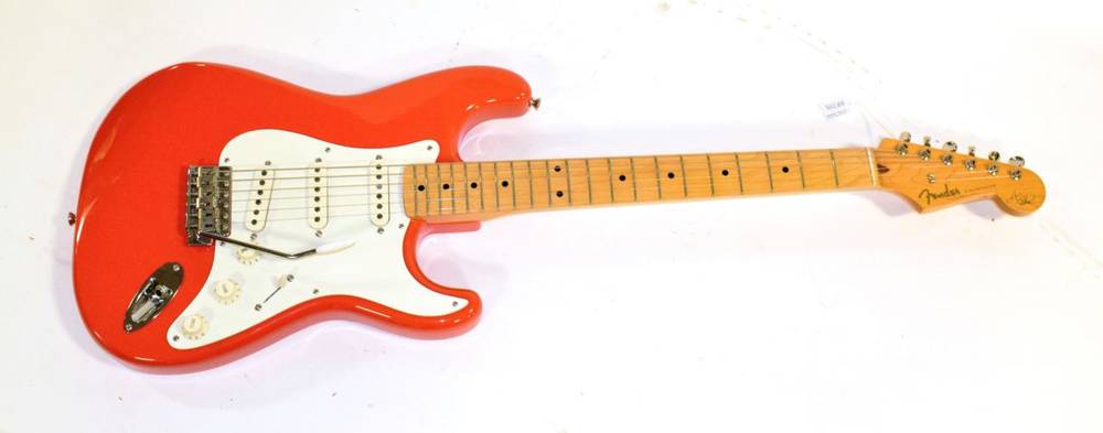 Lot 3028 - Fender 50th Anniversary Stratocaster Guitar (1996) Made in Japan no.V026874, red with cream scratch