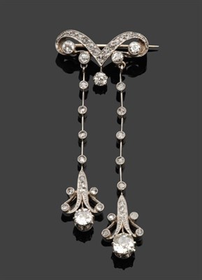 Lot 519 - A Diamond Drop Brooch, a pointed and curved motif suspends two drops of knife edge bars set...