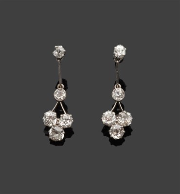 Lot 523 - A Pair of 18 Carat White Gold Diamond Drop Earrings, an old cut diamond stud suspends a knife...