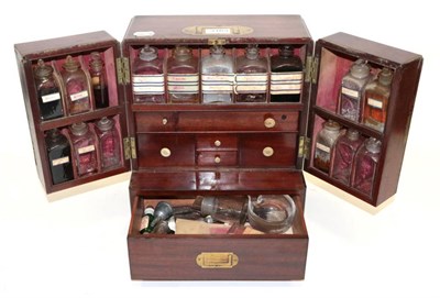 Lot 3163 - Apothecary Chest in mahogany cabinet with top section having opening doors each containing six...