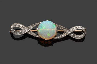 Lot 531 - An Opal and Diamond Brooch, a round cabochon opal in a claw setting is flanked by a looped motif on