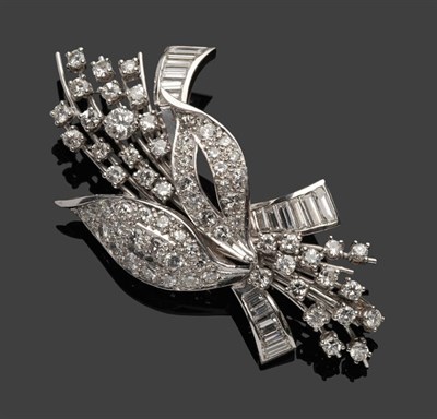 Lot 533 - A Diamond Spray Brooch, round brilliant and baguette cut diamonds in white claw and channel...