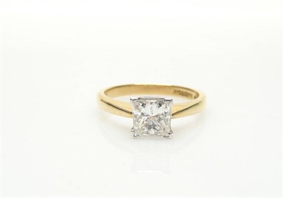 Lot 539 - An 18 Carat Gold Princess Cut Diamond Solitaire Ring, the diamond in a four white corner claw...