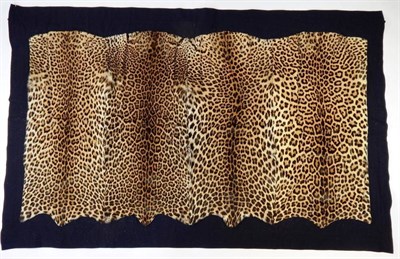 Lot 2109 - Taxidermy: African Leopard Skin Coaching Blanket (Panthera pardus), circa 1920-1930, a superb...