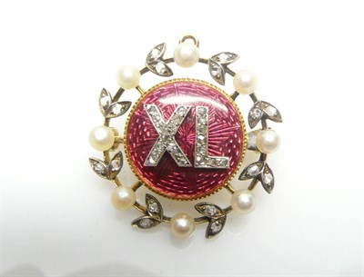 Lot 556 - A Monogram Brooch, a circular red guilloche enamel centre has an applied monogram 'XL', in rose cut