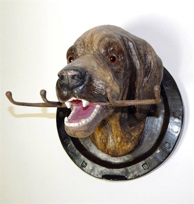 Lot 2261 - Works of Art: A Ceramic Wall Hanging Fox Hound Whip Rack, in the form of a Fox Hound holding a four