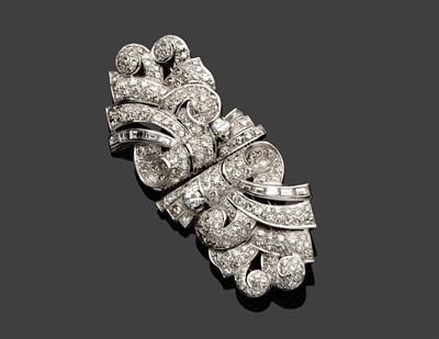 Lot 563 - A Diamond Double Clip Brooch, circa 1930, the scrolling design set throughout with brilliant...