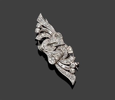 Lot 564 - A Diamond Double Clip Brooch, circa 1930, the scrolling design set throughout with brilliant...