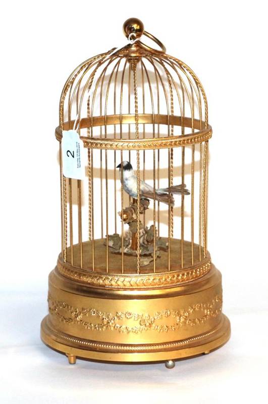 Lot 2 - A Reuge Swiss musical bird cage.