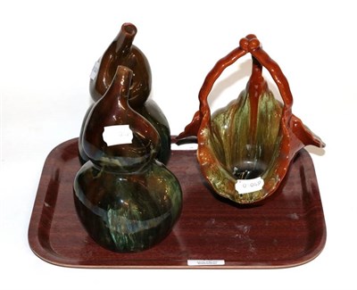 Lot 10 - A pair of Linthorpe pottery double gourd vases; and a Linthorpe pottery basket (3)