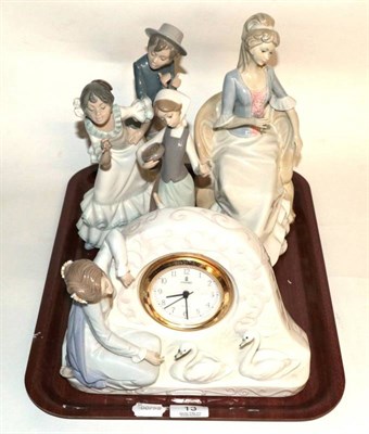 Lot 13 - A Lladro figural mantel clock; a Nao group of Spanish dancers; a Lladro model of a girl and...