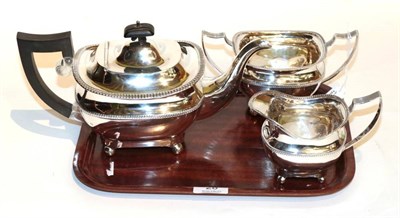 Lot 28 - A matched silver three piece tea service, S Blanckensee & Son, Birmingham 1924; and Sharman D...