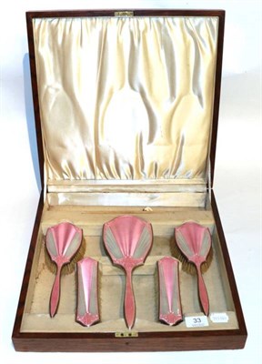 Lot 33 - A silver and pink guilloche enamel dressing table set in an oak case
