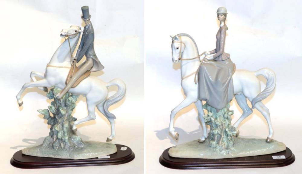 Lot 36 - A pair of large Lladro models of a lady and gent riding (2)
