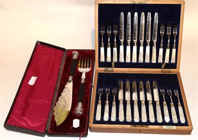 Lot 37 - Twelve pairs of electroplated fruit knives and forks, with mother of pearl handled and silver...