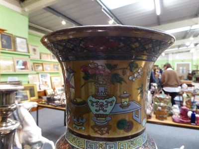 Lot 44 - A Chinese porcelain Gu vase decorated in enamels with vases and precious objects, mark to base,...