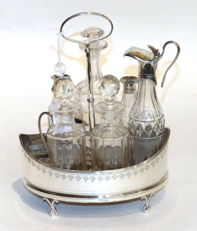 Lot 49 - A George III silver cruet frame, Robert Hennel, London 1791, with a part set of bottles, some...