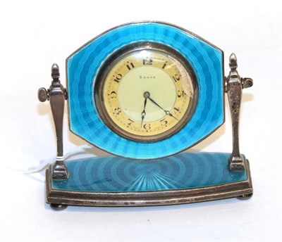 Lot 54 - A silver and guilloche enamel bedside timepiece