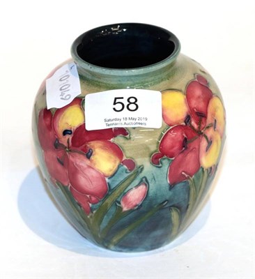 Lot 58 - A Walter Moorcroft Hibiscus pattern vase