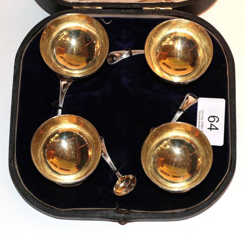 Lot 64 - A set of four Victorian silver pedestal salts and spoons by George Unite, cased